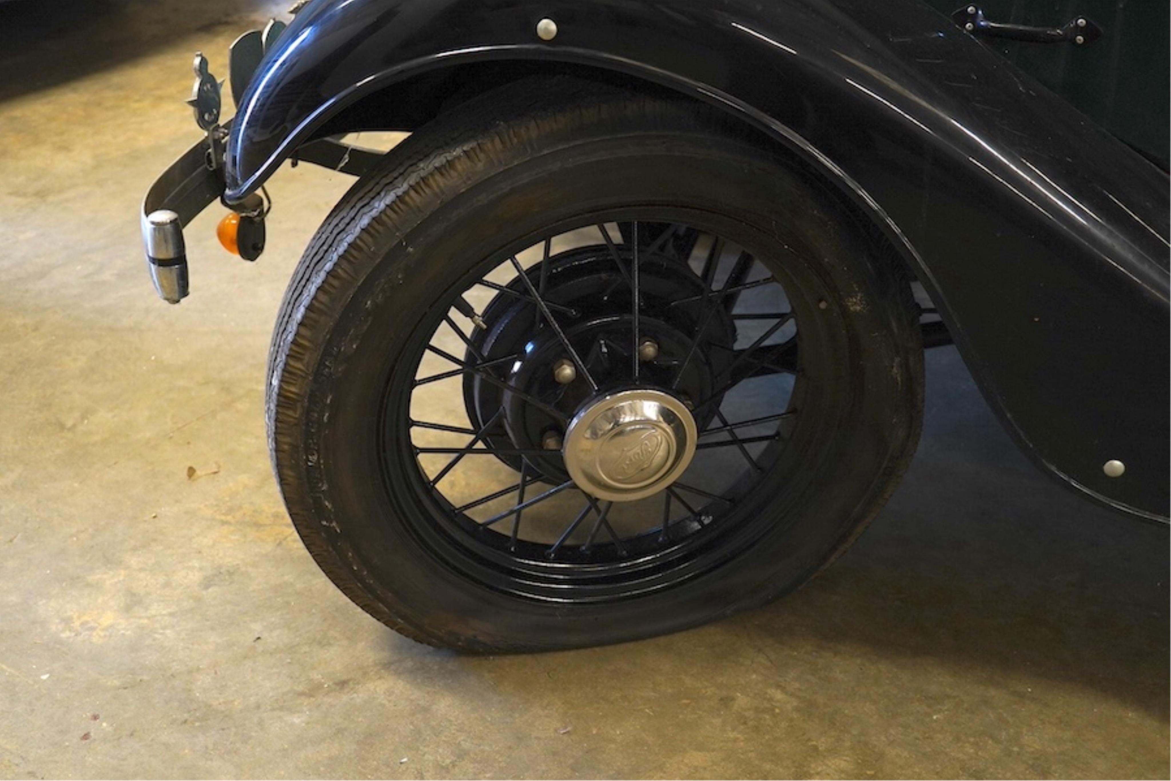 A 1936 Ford Model Y saloon, reg. no. CYM868, 885cc, dark green, odometer showing 93,057 miles. Restored by the late owner, to a very high standard and winner of seven Concours d’Elegance awards
